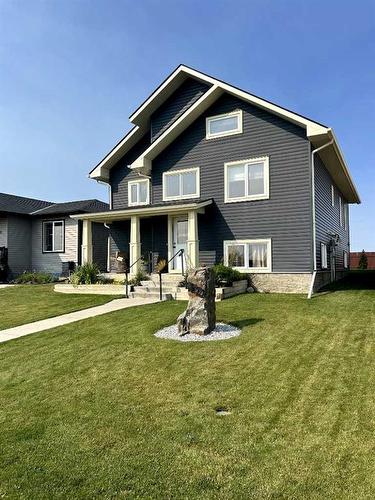 1022 Livingston Way, Pincher Creek, AB - Outdoor With Facade