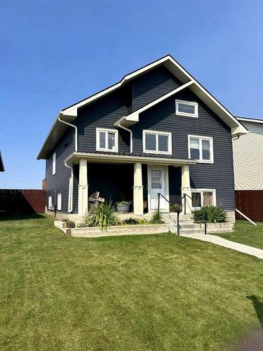 1022 Livingston Way, Pincher Creek, AB - Outdoor With Facade