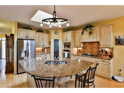 1203 Whispering Greens Place, Vulcan, AB - Indoor Photo Showing Kitchen With Stainless Steel Kitchen With Double Sink With Upgraded Kitchen