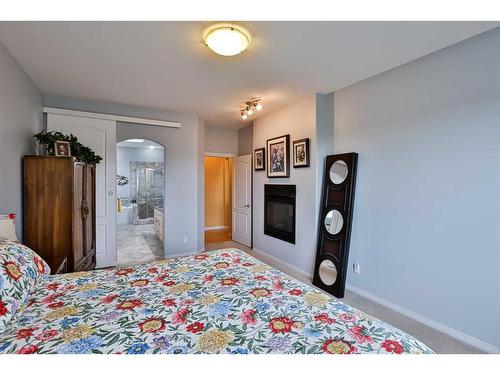 1203 Whispering Greens Place, Vulcan, AB - Indoor Photo Showing Bedroom