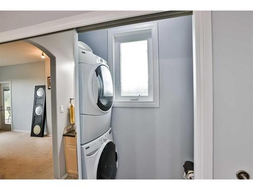 1203 Whispering Greens Place, Vulcan, AB - Indoor Photo Showing Laundry Room