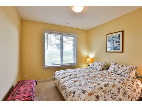 1203 Whispering Greens Place, Vulcan, AB - Indoor Photo Showing Bedroom