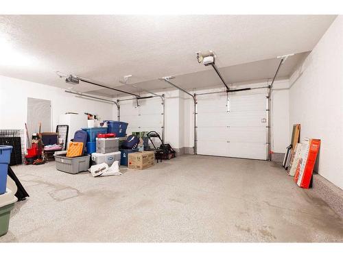 53 Canyoncrest Point West, Lethbridge, AB - Indoor Photo Showing Garage