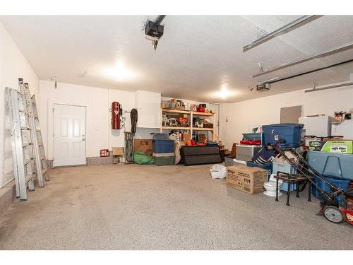 53 Canyoncrest Point West, Lethbridge, AB - Indoor Photo Showing Garage