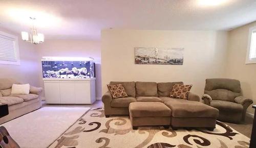 602 Mt Sundance Bay West, Lethbridge, AB - Indoor Photo Showing Living Room