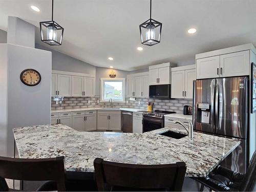 214 Stonecrest Bay West, Lethbridge, AB - Indoor Photo Showing Kitchen With Double Sink With Upgraded Kitchen