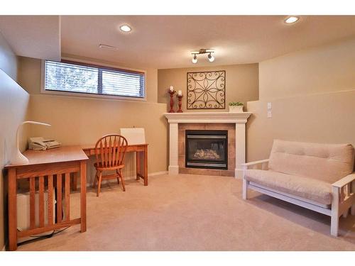 310 Squamish Court West, Lethbridge, AB - Indoor With Fireplace