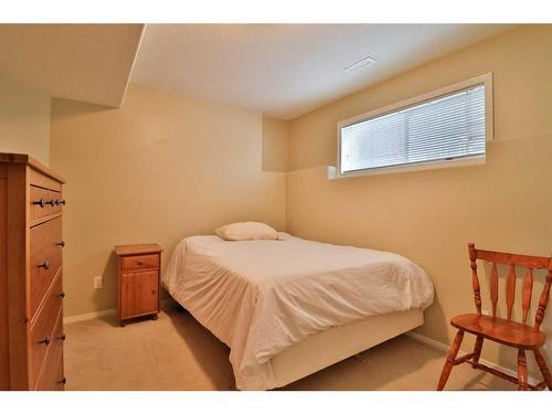 310 Squamish Court West, Lethbridge, AB - Indoor Photo Showing Bedroom