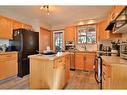 3 Squamish Boulevard West, Lethbridge, AB  - Indoor Photo Showing Kitchen With Double Sink 