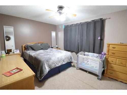 5507 62 Avenue, Taber, AB - Indoor Photo Showing Bedroom