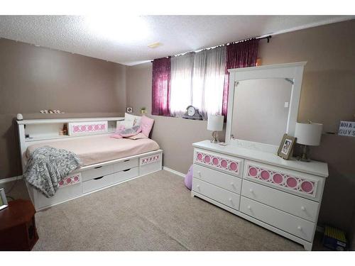 5507 62 Avenue, Taber, AB - Indoor Photo Showing Bedroom