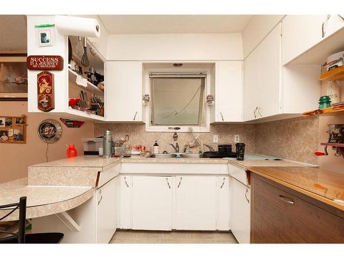 2072 19 Street North, Lethbridge, AB - Indoor Photo Showing Kitchen With Double Sink