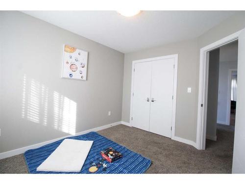 4310 Aspen Road, Coalhurst, AB - Indoor Photo Showing Bedroom