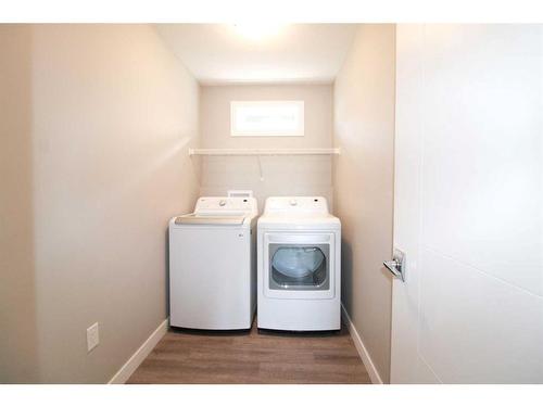 4310 Aspen Road, Coalhurst, AB - Indoor Photo Showing Laundry Room