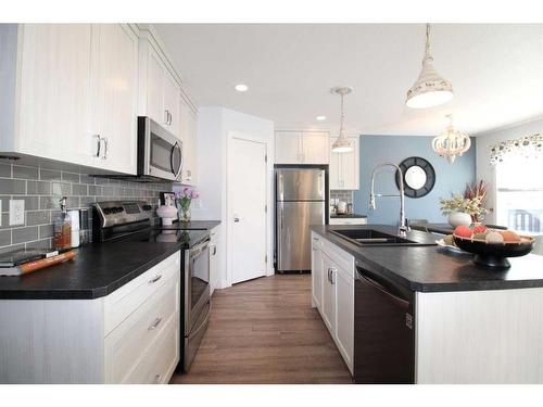 4310 Aspen Road, Coalhurst, AB - Indoor Photo Showing Kitchen With Stainless Steel Kitchen With Double Sink With Upgraded Kitchen