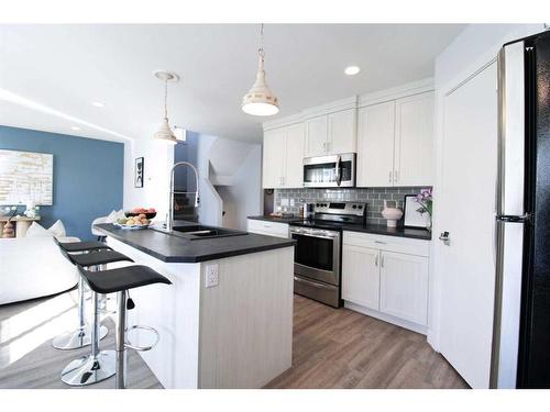 4310 Aspen Road, Coalhurst, AB - Indoor Photo Showing Kitchen With Stainless Steel Kitchen With Upgraded Kitchen