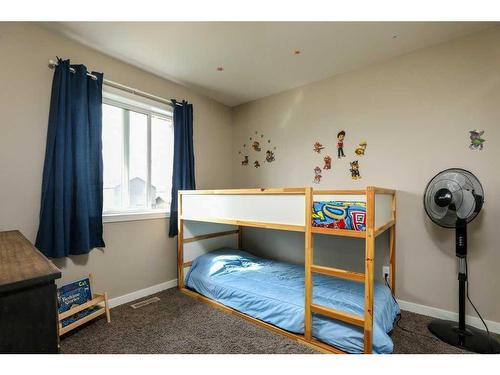 578 Blackwolf Boulevard North, Lethbridge, AB - Indoor Photo Showing Bedroom