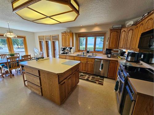 301 Centre Avenue, Milk River, AB - Indoor Photo Showing Kitchen With Double Sink