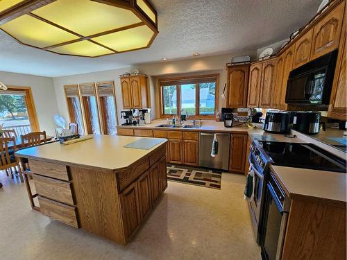 301 Centre Avenue, Milk River, AB - Indoor Photo Showing Kitchen With Double Sink