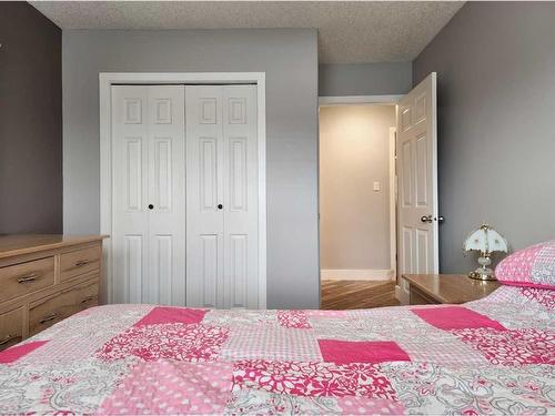 11 Link Spur, Claresholm, AB - Indoor Photo Showing Bedroom