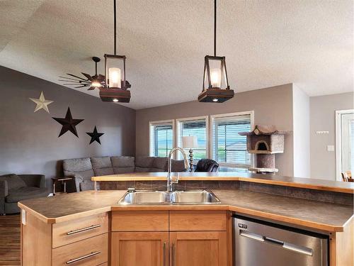 11 Link Spur, Claresholm, AB - Indoor Photo Showing Kitchen With Double Sink