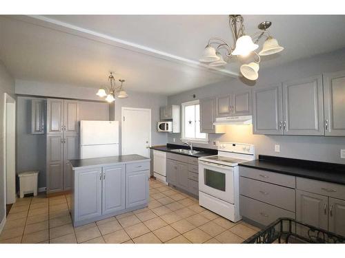 1214 5A Avenue South, Lethbridge, AB - Indoor Photo Showing Kitchen With Double Sink