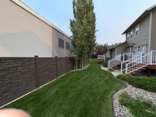 #4-404 Couleecreek Boulevard South, Lethbridge, AB - Outdoor With Deck Patio Veranda With Exterior