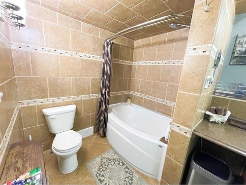 131 And 135 2 Avenue South, Champion, AB - Indoor Photo Showing Bathroom