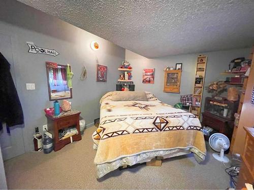 131 And 135 2 Avenue South, Champion, AB - Indoor Photo Showing Bedroom