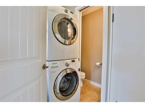 329 10B Street, Nobleford, AB - Indoor Photo Showing Laundry Room