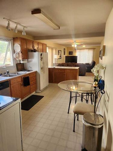 201 Centre Avenue, Milk River, AB - Indoor Photo Showing Kitchen With Double Sink