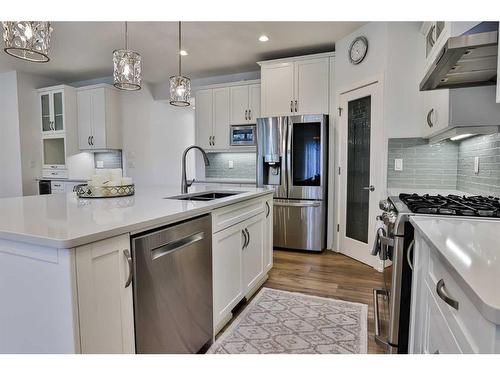 603 Canyonview Landing West, Lethbridge, AB - Indoor Photo Showing Kitchen With Double Sink With Upgraded Kitchen