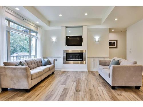 603 Canyonview Landing West, Lethbridge, AB - Indoor Photo Showing Living Room With Fireplace