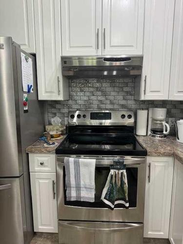 203-1601 9A Avenue South, Lethbridge, AB - Indoor Photo Showing Kitchen With Stainless Steel Kitchen With Upgraded Kitchen