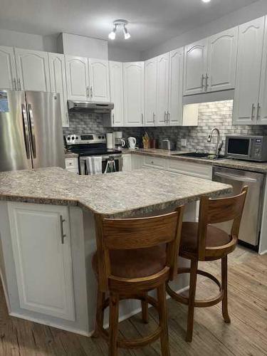 203-1601 9A Avenue South, Lethbridge, AB - Indoor Photo Showing Kitchen With Stainless Steel Kitchen With Upgraded Kitchen