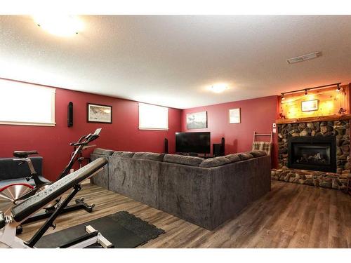 615 51 Avenue, Coalhurst, AB - Indoor With Fireplace