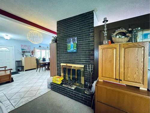 13 Dalhousie Road West, Lethbridge, AB - Indoor With Fireplace