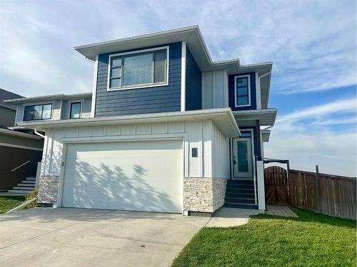 401 Devonia Way West, Lethbridge, AB - Outdoor With Facade