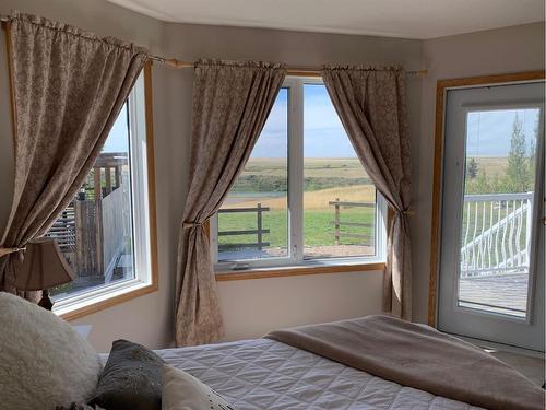 103038 Rge Rd 165, Rural Taber, M.D. Of, AB - Indoor Photo Showing Bedroom