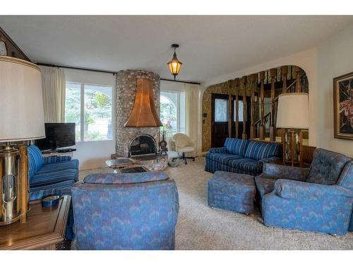 2808 South Parkside Drive South, Lethbridge, AB - Indoor Photo Showing Living Room With Fireplace