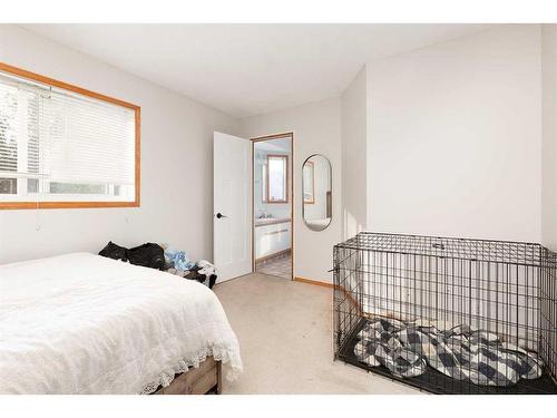 112 Mt Blakiston Road West, Lethbridge, AB - Indoor Photo Showing Bedroom