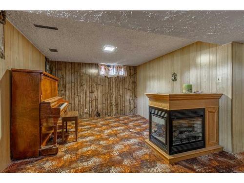 2109 26 Street South, Lethbridge, AB - Indoor Photo Showing Other Room With Fireplace