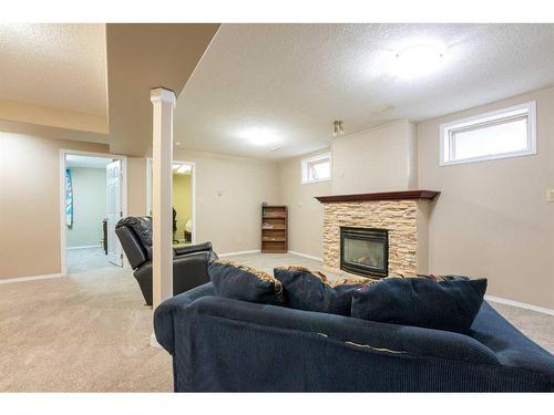 2007 15 Street, Coaldale, AB - Indoor With Fireplace