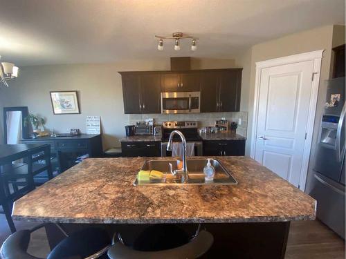 797 Silkstone Close West, Lethbridge, AB - Indoor Photo Showing Kitchen With Double Sink With Upgraded Kitchen