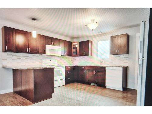 5502 54 Avenue, Taber, AB - Indoor Photo Showing Kitchen