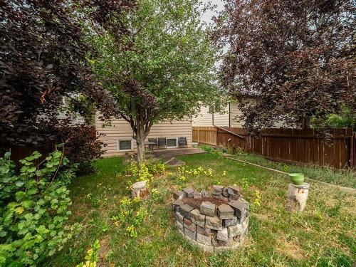 119 Cayuga Crescent West, Lethbridge, AB - Outdoor With Backyard