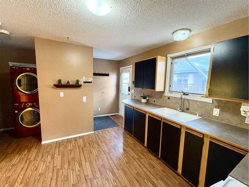 1829 7 Avenue North, Lethbridge, AB - Indoor Photo Showing Kitchen With Double Sink