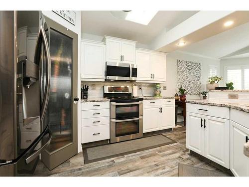 2803 48 Avenue South, Lethbridge, AB - Indoor Photo Showing Kitchen With Upgraded Kitchen