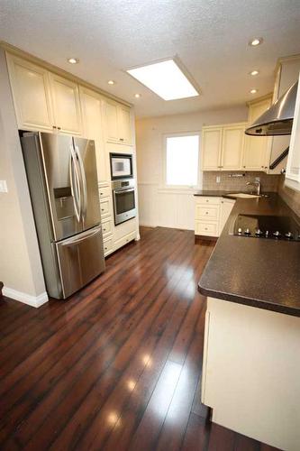 349 Leaside Avenue South, Lethbridge, AB - Indoor Photo Showing Kitchen With Double Sink