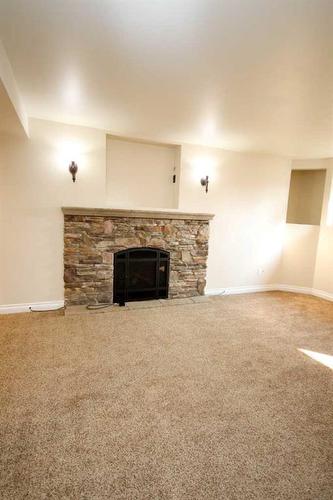 349 Leaside Avenue South, Lethbridge, AB - Indoor With Fireplace